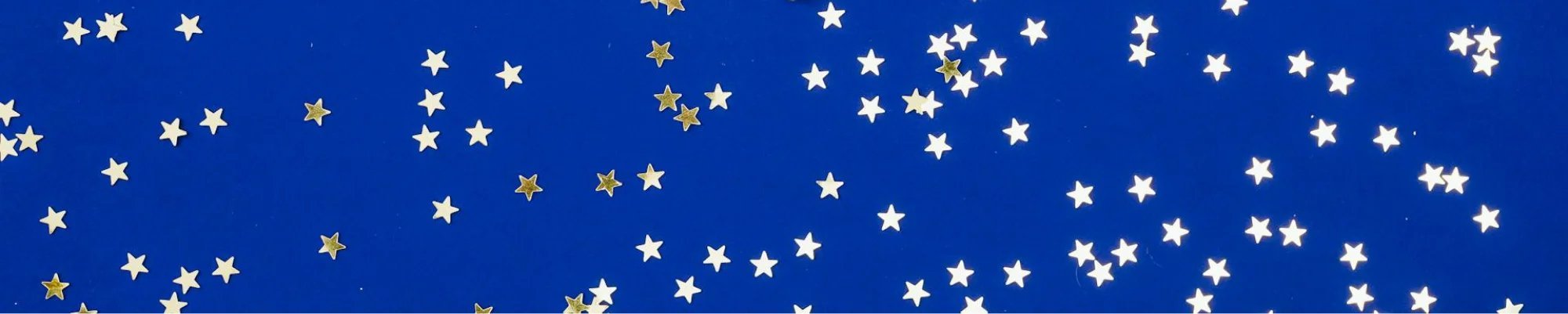 Silver star confetti on a blue background